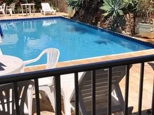 Imagem: A casa em condomínio possui 3 Dormitórios, 2 Suítes, 4