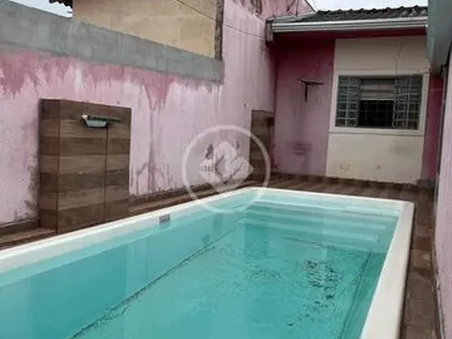 Imagem: A casa possui 2 Dormitórios, 2 Banheiros, 1 Vaga na