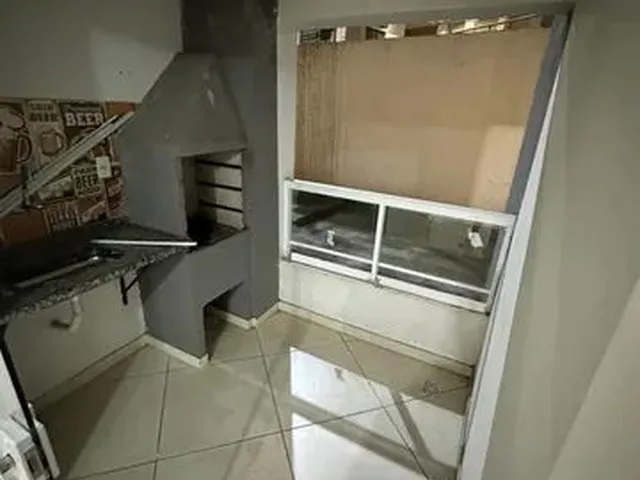 Imagem: O apartamento possui 2 Dormitórios, 1 Suíte, 2 Banheiros,