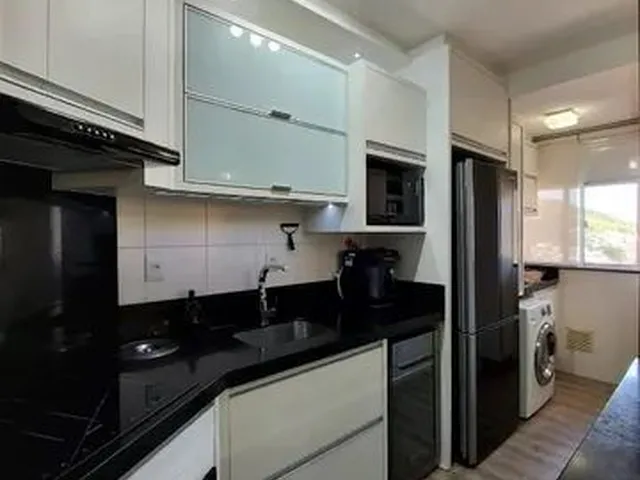Imagem: O apartamento possui 2 Dormitórios, 1 Suíte, 2 Banheiros,