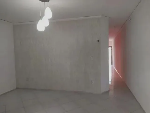 Imagem 5: Casa em Maria Ortiz com Quintal e Garagem