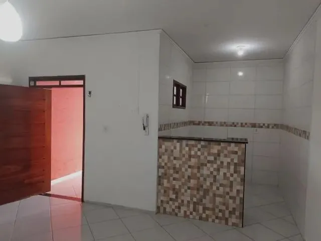 Imagem 4: Casa em Maria Ortiz com Quintal e Garagem