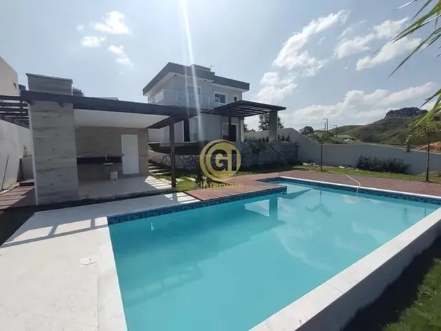 Imagem: A casa em condomínio possui 4 Dormitórios, 3 Suítes, 4