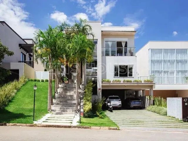 Imagem: A casa possui 3 Dormitórios, 3 Suítes, 5 Banheiros, 4