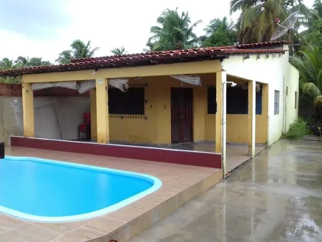 Imagem: A casa possui 3 Dormitórios, 3 Vagas na garagem e está