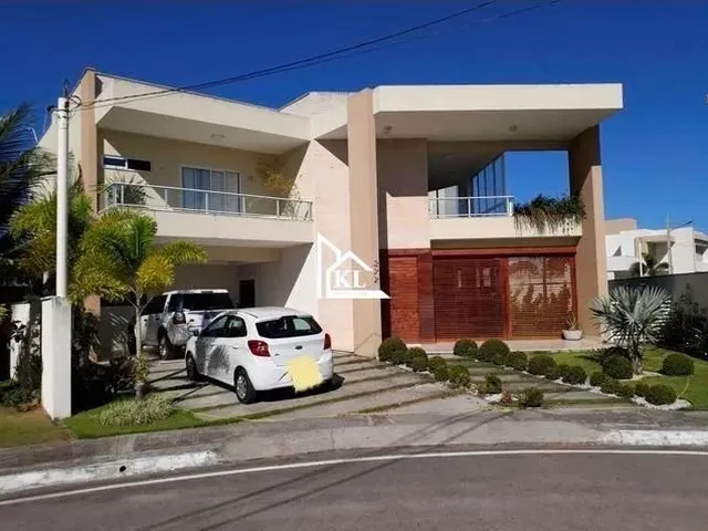 Imagem: A casa possui 5 Dormitórios, 4 Suítes, 5 Banheiros, 4