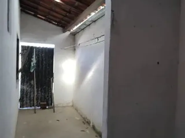 Imagem: A casa possui 2 Dormitórios, 2 Banheiros, 2 Vagas na