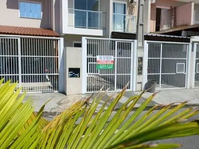 Imagem: A casa possui 2 Dormitórios, 2 Banheiros, 1 Vaga na
