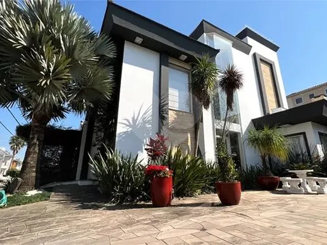 Imagem: Casa Triplex Mobiliado com Elevador Panorâmico