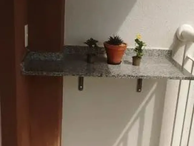 Imagem: O apartamento possui 2 Dormitórios, 1 Suíte, 2 Banheiros,