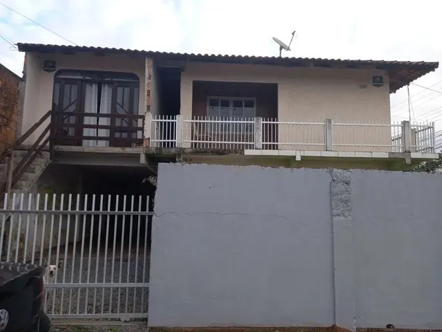 Imagem: Terrenho com Casas de Aluguel