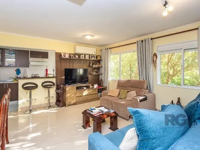 Imagem: O apartamento possui 2 Dormitórios, 1 Suíte, 2 Banheiros,