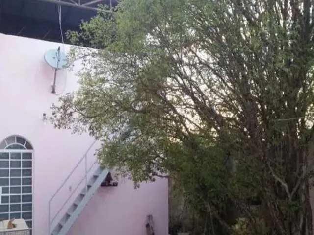 Imagem 8: Casa em Rua Tranquila, com 3 Quartos e 4 Vagas de Garagem