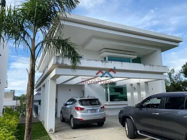 Imagem: A casa em condomínio possui 5 Dormitórios, 3 Suítes, 2