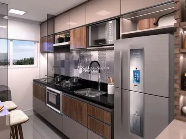 Imagem: O apartamento possui 2 Dormitórios, 1 Banheiro, 1 Vaga na