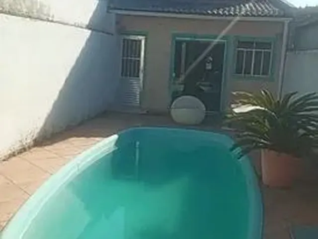 Imagem: A casa possui 5 Dormitórios, 3 Banheiros, 1 Vaga na