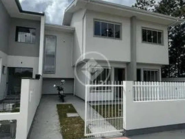Imagem 1: Fac_Lindo Sobrado com Dois Quartos Sendo Duas Suites, Lavabo, Cozinha Americana e Garagem