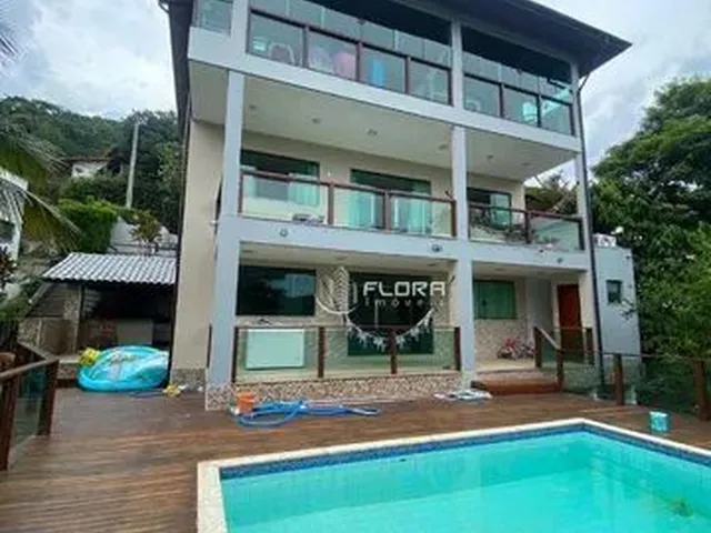 Imagem: A casa em condomínio possui 5 Dormitórios, 2 Suítes, 5