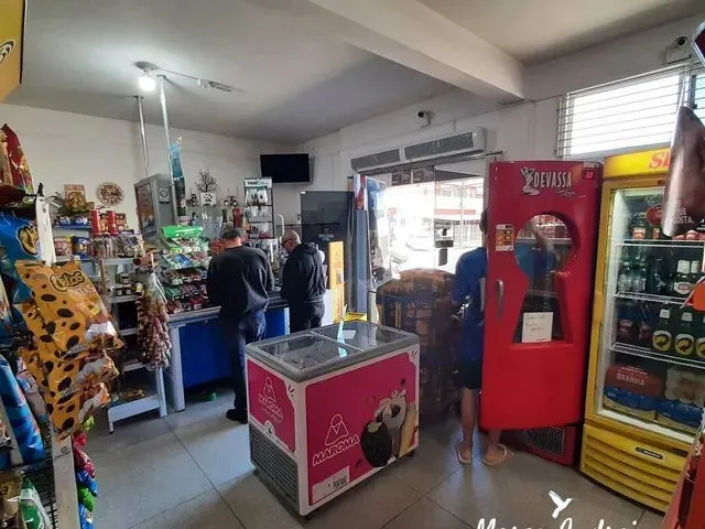 Imagem 12: Investimento, Prédio com Moradia e Mercado em Pleno Funcionamento