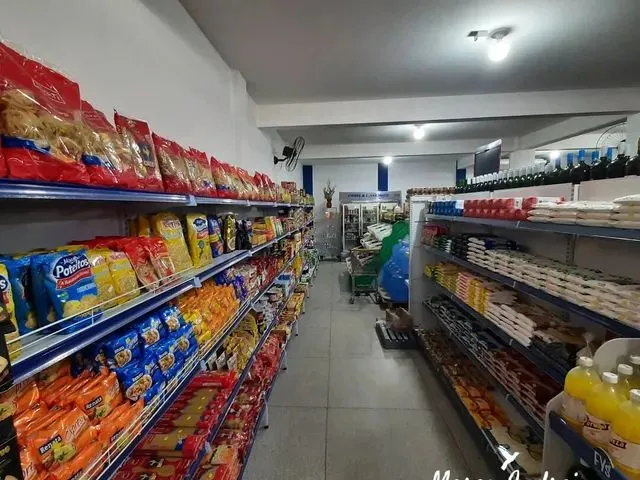 Imagem 13: Investimento, Prédio com Moradia e Mercado em Pleno Funcionamento