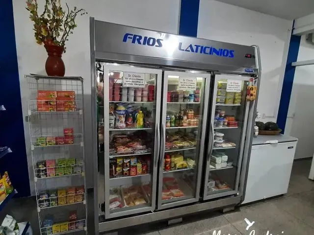 Imagem 7: Investimento, Prédio com Moradia e Mercado em Pleno Funcionamento