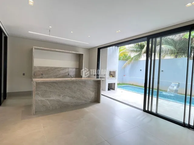Imagem: A casa possui 4 Dormitórios, 4 Suítes, 5 Banheiros,