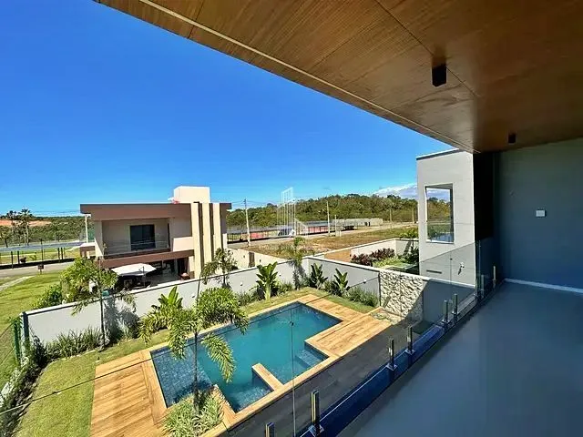 Imagem: A casa possui 4 Dormitórios, 4 Suítes, 5 Banheiros, 4