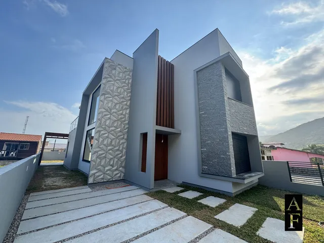 Imagem: A casa possui 3 Dormitórios, 2 Suítes, 3 Banheiros, 2