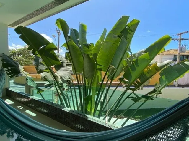 Imagem 16: Com ambientes amplos e modernos essa casa duplex vista mar com quatro suítes e espaço