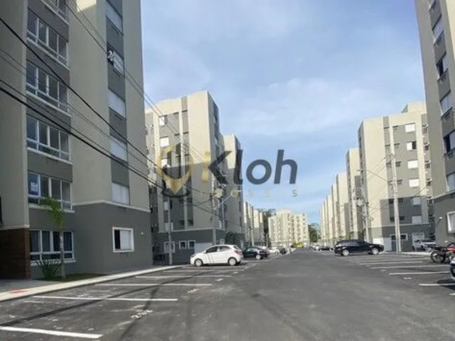 Imagem: O apartamento possui 2 Dormitórios, 1 Suíte, 2 Banheiros,