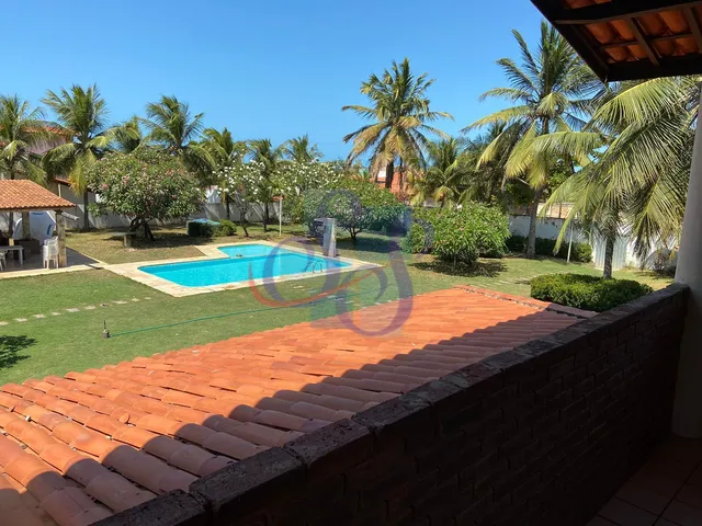 Imagem 6: Ampla Casa com 8 Quartos e Lazer Completo no Porto das Dunas