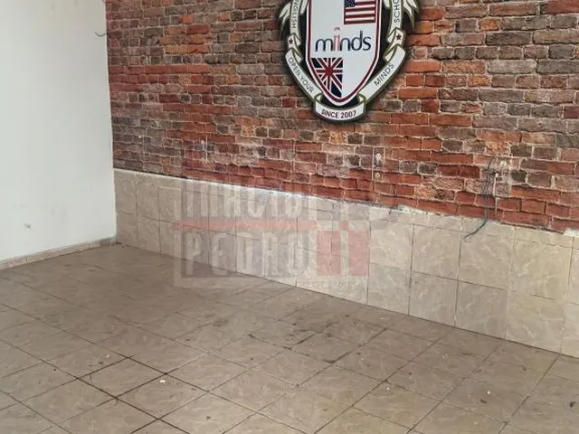Imagem 10: Casa na Rua Ernesto de Paula Santos, 340 ( Antiga Minds, Escola de Inglês