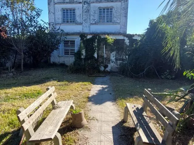 Imagem: A casa possui 2 Dormitórios, 2 Banheiros, 1 Vaga na