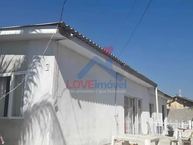 Imagem: Casa Aconchegante e Potencial de Renda em
