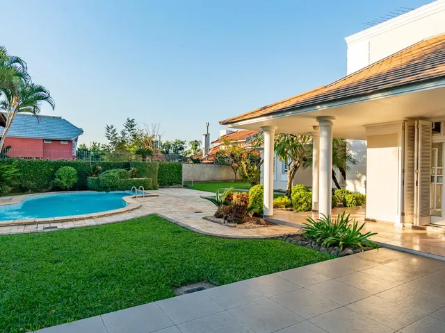 Imagem 2: A casa possui 5 dormitórios, sendo 4 suítes