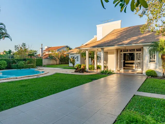 Imagem 3: A casa possui 5 dormitórios, sendo 4 suítes