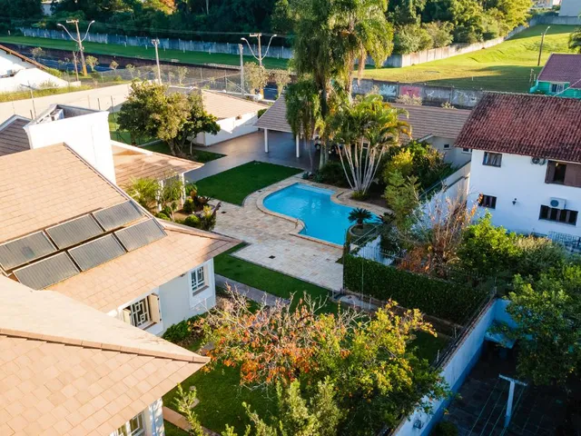 Imagem 7: A casa possui 5 dormitórios, sendo 4 suítes