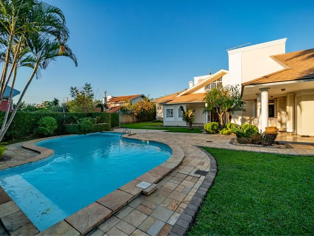 Imagem 8: A casa possui 5 dormitórios, sendo 4 suítes