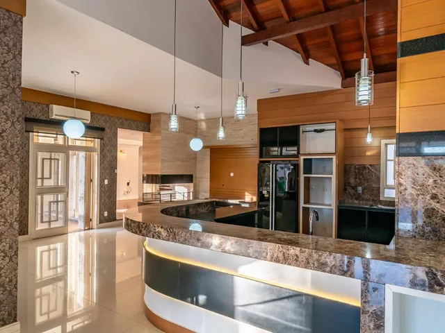 Imagem 12: A casa possui 5 dormitórios, sendo 4 suítes