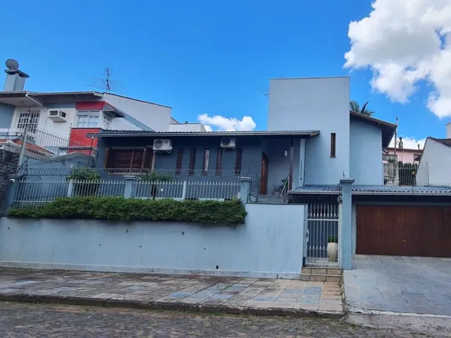 Imagem: Casa com 04 dormitórios e 03 vagas de garagem