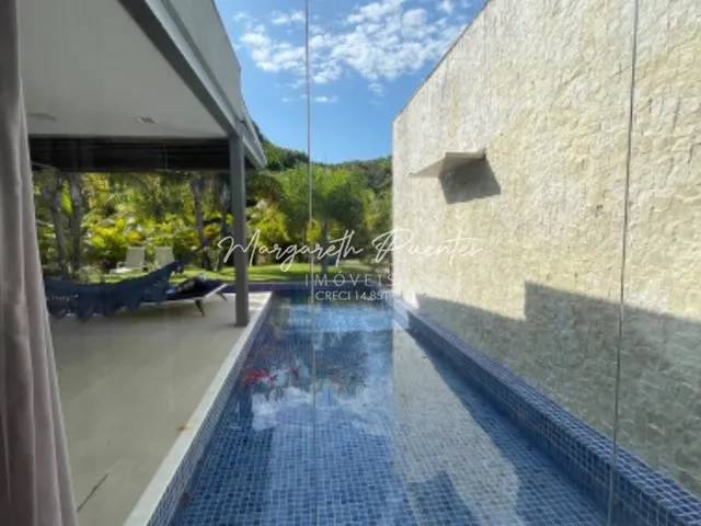 Imagem 3: TÉRREA com 5 quartos, sendo 3 suítes, Home Cine, Home Office, linda piscina e jardim à