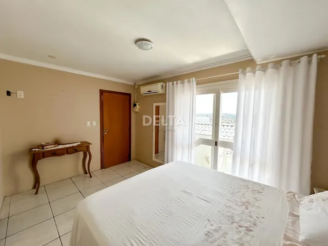 Imagem 16: Excelente Casa com 3 Dormitórios, sendo 2 suítes, pátio com Piscina e Garagem para 2