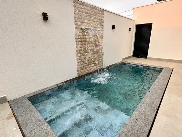 Imagem 5: Casa Térrea com 3 suítes, 4 vagas, Salas integradas, Área gourmet, Piscina no