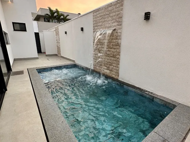 Imagem 3: Casa Térrea com 3 suítes, 4 vagas, Salas integradas, Área gourmet, Piscina no