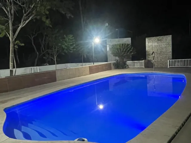 Imagem 3: Chácara À Venda Perto de Cuiabá com Casa, Piscina, Campo, Rio e Área Ampla para Lazer