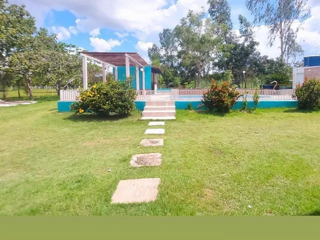 Imagem 10: Chácara À Venda Perto de Cuiabá com Casa, Piscina, Campo, Rio e Área Ampla para Lazer
