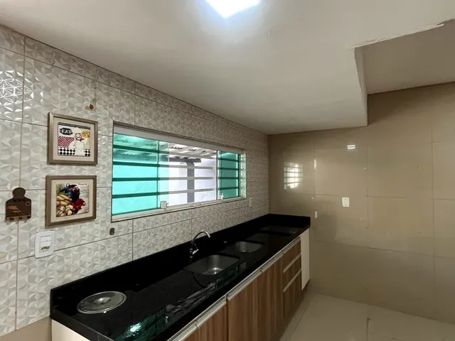 Imagem: A casa possui 3 Dormitórios, 3 Banheiros, 3 Vagas na
