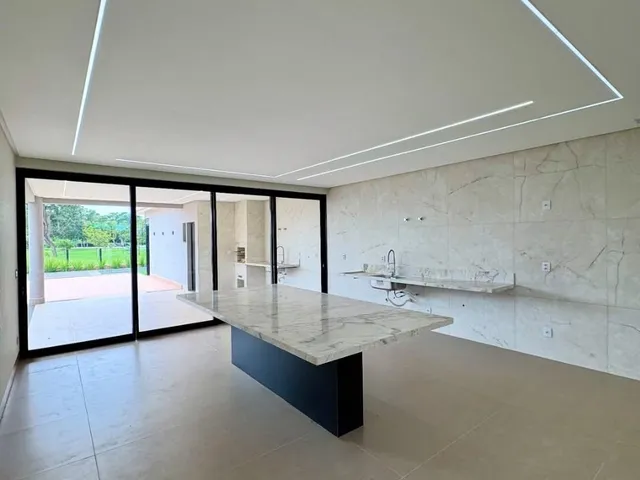 Imagem 13: Casa de Luxo com 4 Suítes, Piscina e Acabamento Premium no Portal do Sol Green