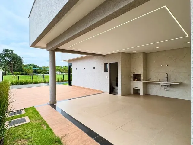 Imagem 2: Casa de Luxo com 4 Suítes, Piscina e Acabamento Premium no Portal do Sol Green