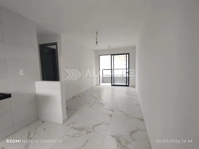 Imagem: O apartamento possui 2 Dormitórios, 1 Suíte, 2 Banheiros,
